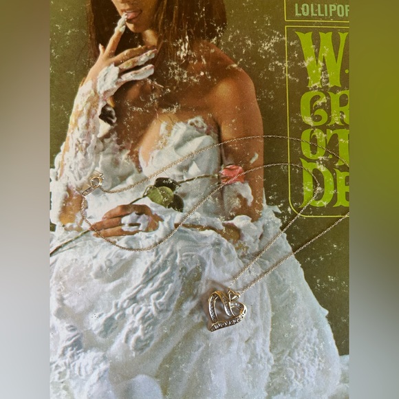 Zales 1/5 CT T.W. Diamond “I Love You” Heart Pendant in 10k Gold - Picture 6 of 6